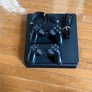 Sony PlayStation 4 Slim Console with DualShock Controllers